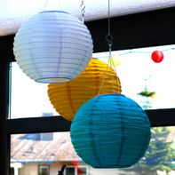 Hanging up paper lanterns and wind chimes